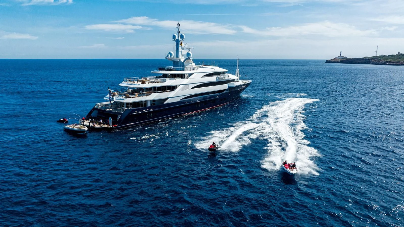 a large ship on the water aboard BATELLO Yacht for Sale