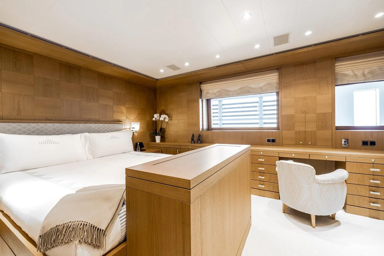 a room with a bed and a desk aboard BATELLO Yacht for Sale