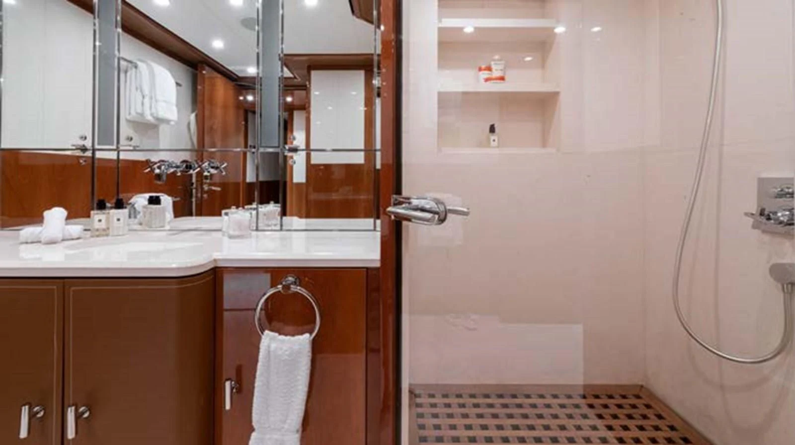 a bathroom with a sink and a mirror aboard BATELLO Yacht for Sale