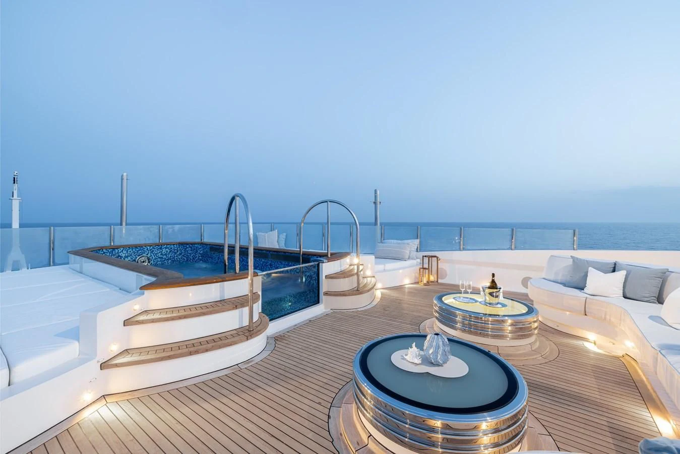 a room with a large bed and a large window overlooking the ocean aboard BATELLO Yacht for Sale