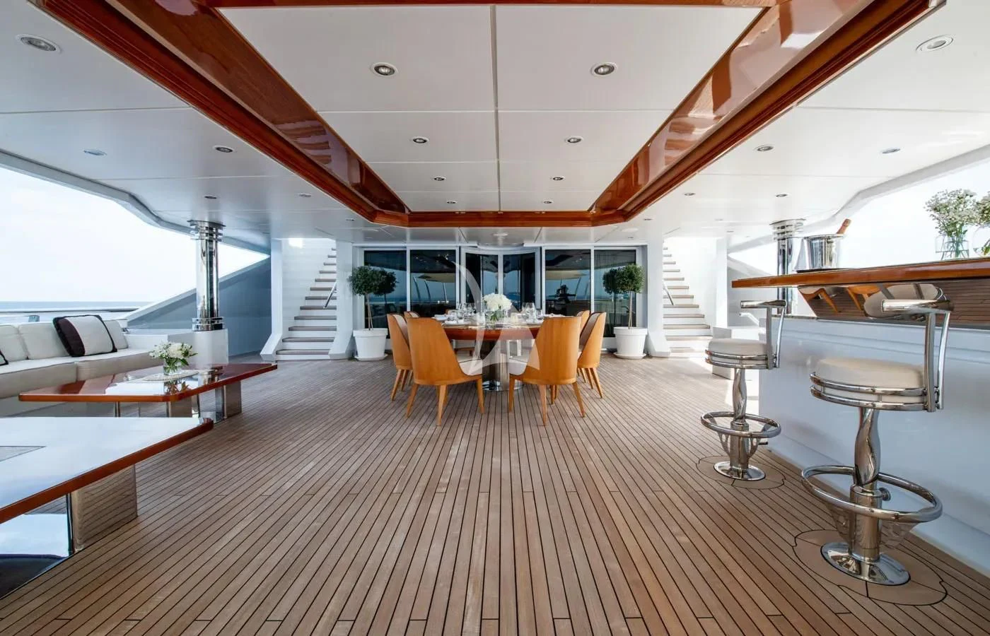 a room with a wood floor and a large open window aboard BATELLO Yacht for Sale