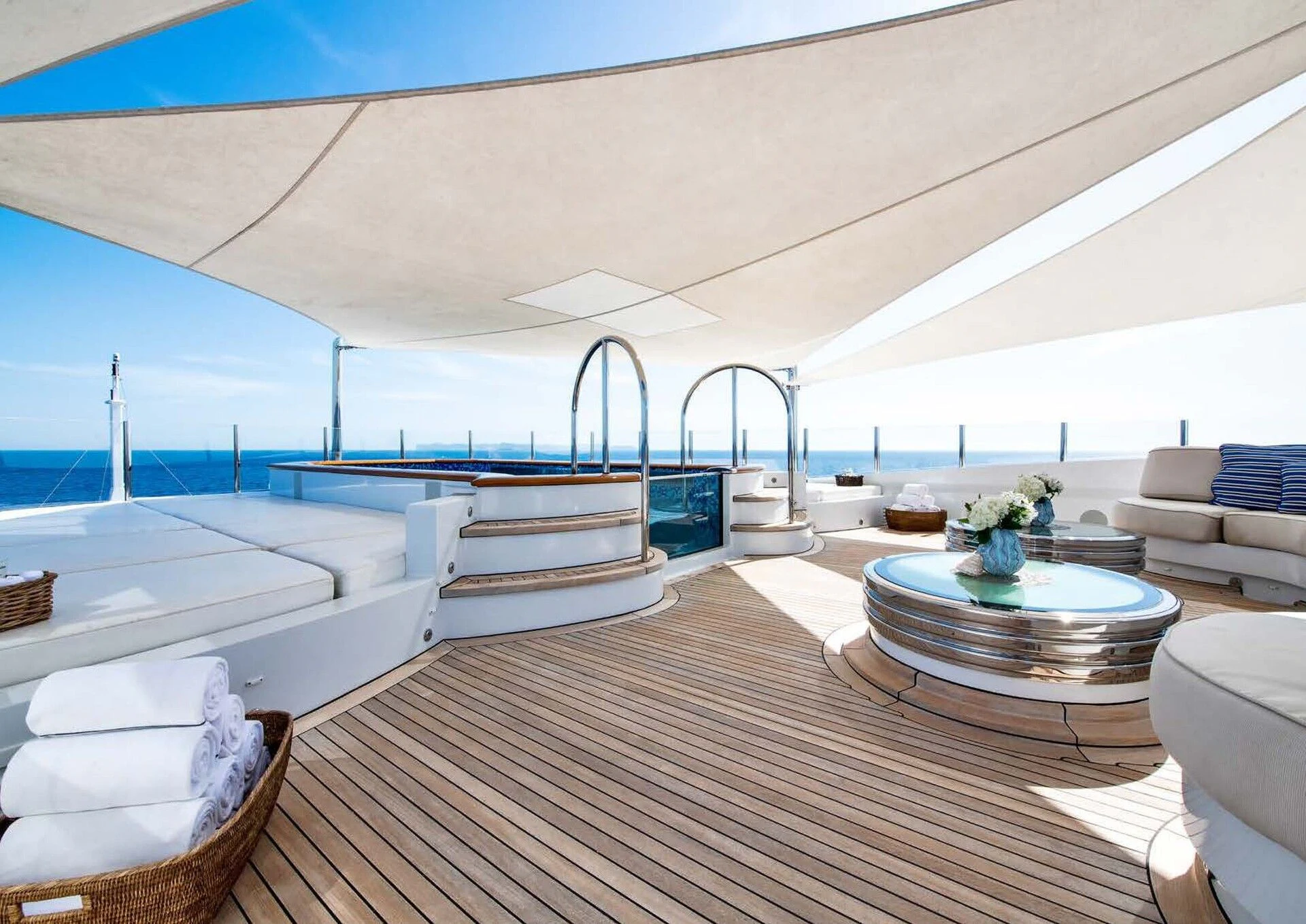 a room with a large balcony aboard BATELLO Yacht for Sale