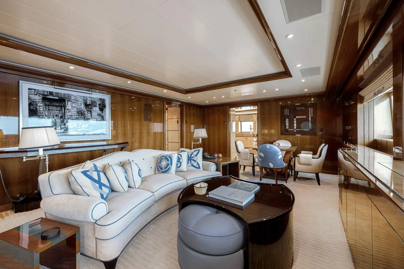 a living room with a couch and a coffee table aboard BATELLO Yacht for Sale