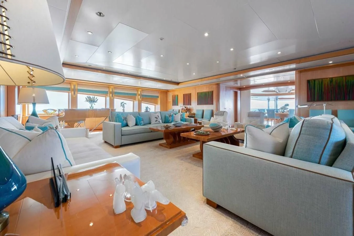 a living room with a large open window aboard BATELLO Yacht for Sale