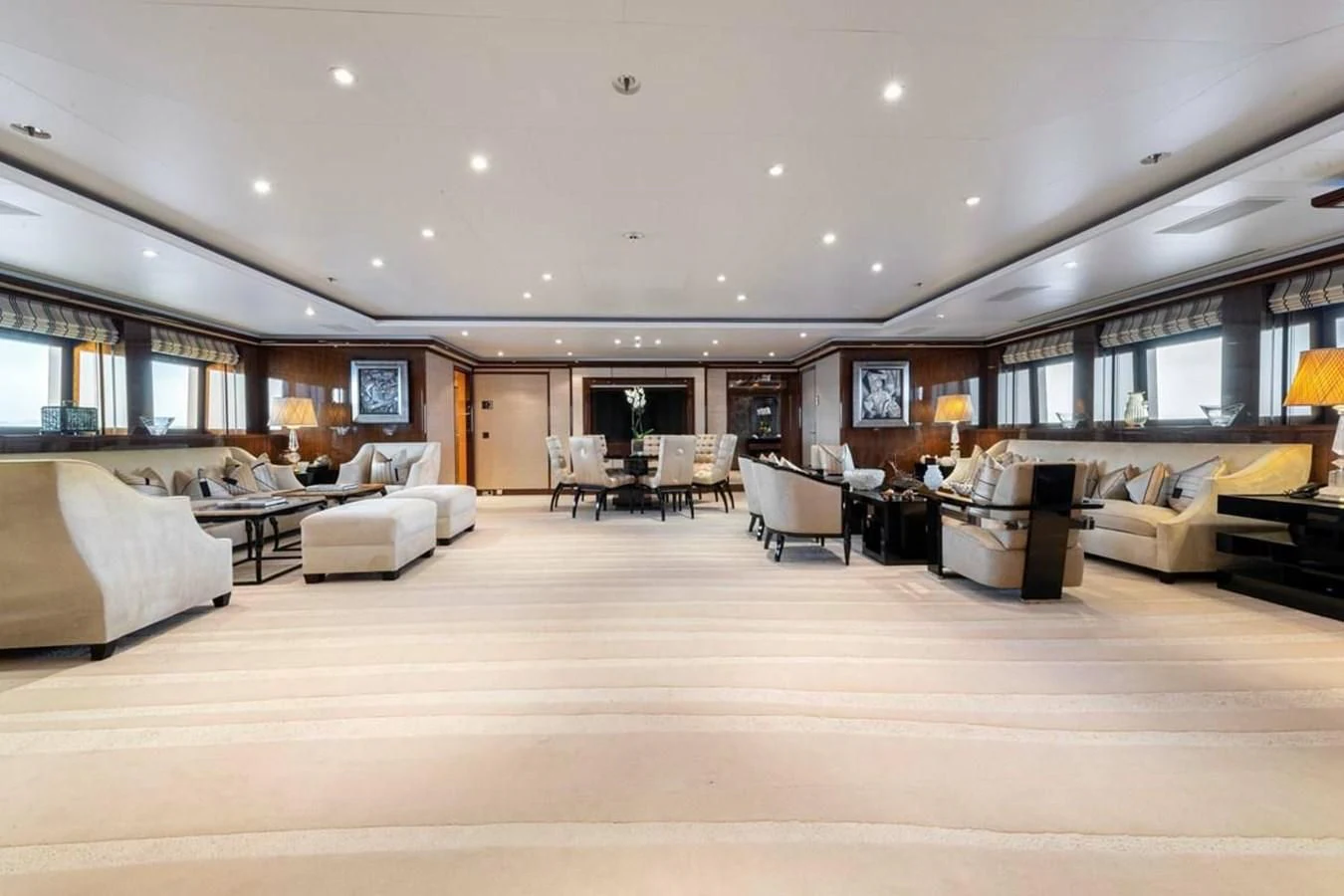 a large living room with a large floor plan aboard BATELLO Yacht for Sale