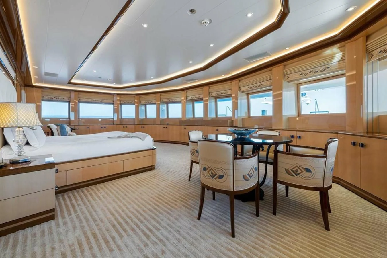 a room with a bed and a table aboard BATELLO Yacht for Sale