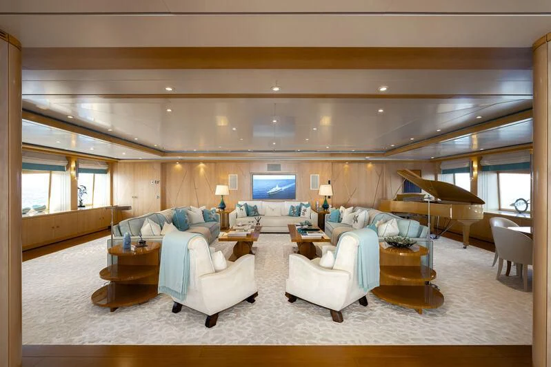a living room with a large window aboard BATELLO Yacht for Sale