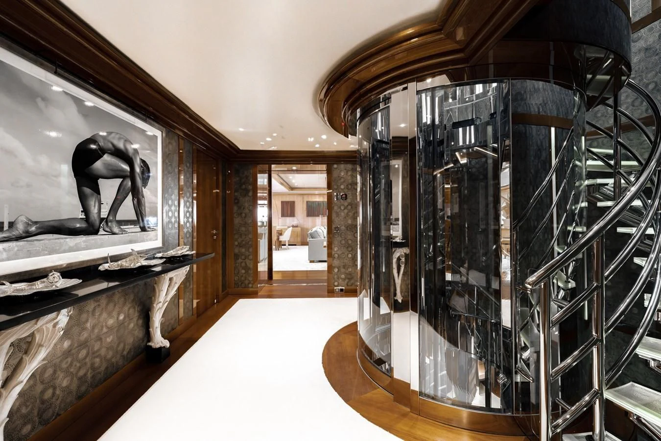 a large black cabinet in a room aboard BATELLO Yacht for Sale