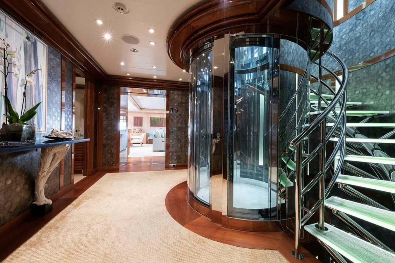 a room with glass walls and a glass door aboard BATELLO Yacht for Sale