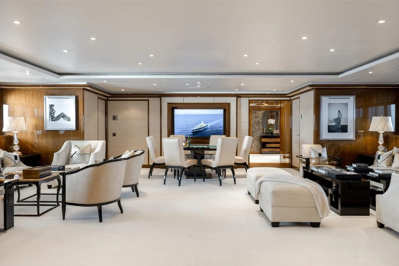 a living room with a large screen aboard BATELLO Yacht for Sale