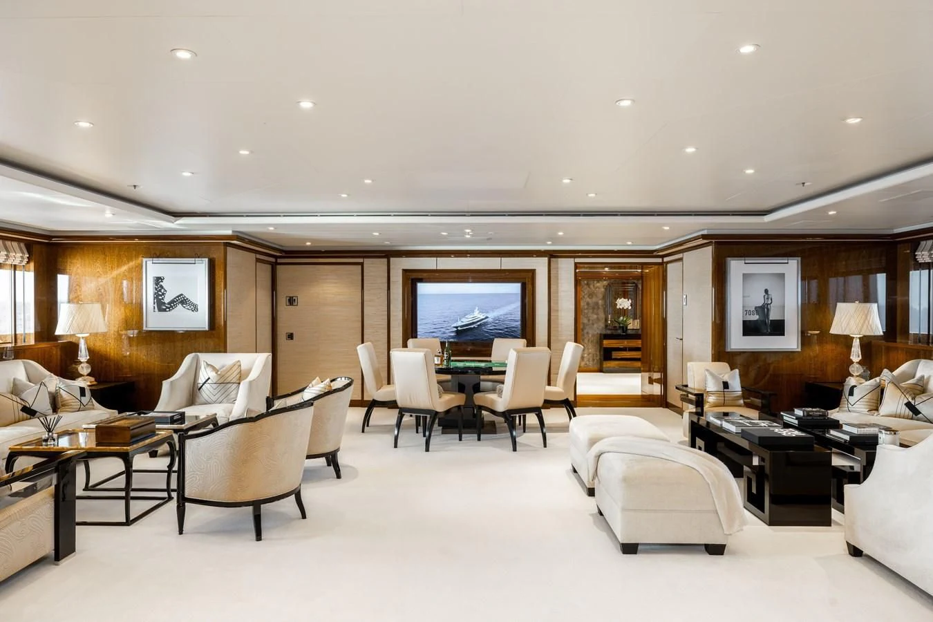a living room with a couch and a table aboard BATELLO Yacht for Sale