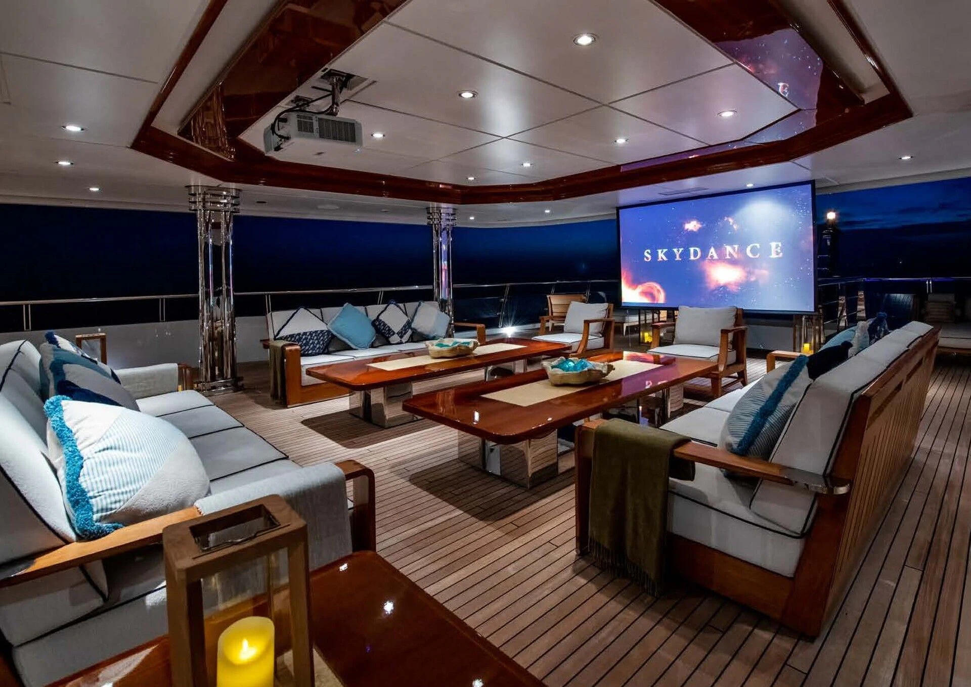 a room with a table and chairs aboard BATELLO Yacht for Sale