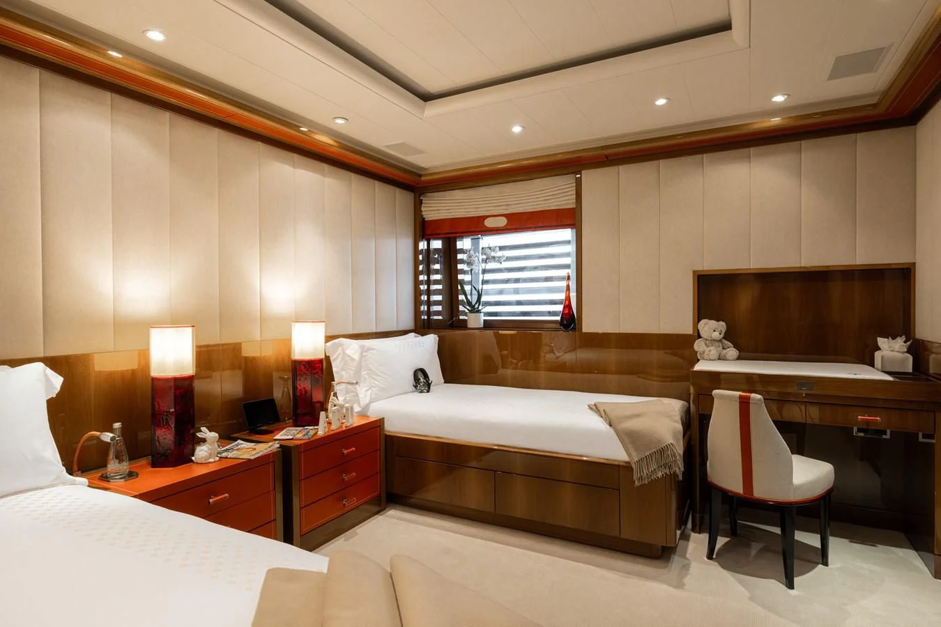 a hotel room with a bed and a desk aboard BATELLO Yacht for Sale
