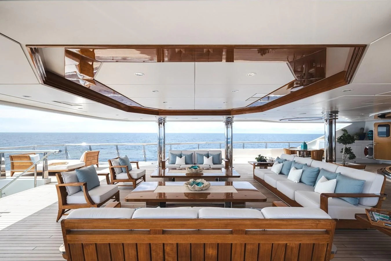 a room with a large balcony overlooking the ocean aboard BATELLO Yacht for Sale