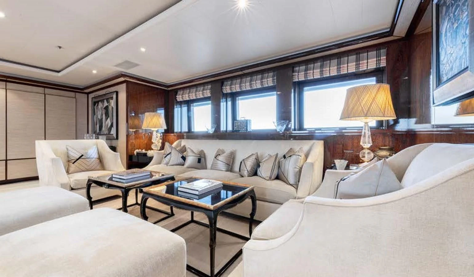 a room with a bed and a table aboard BATELLO Yacht for Sale
