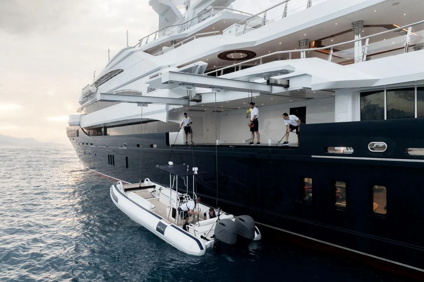a large white boat with people on it aboard BATELLO Yacht for Sale