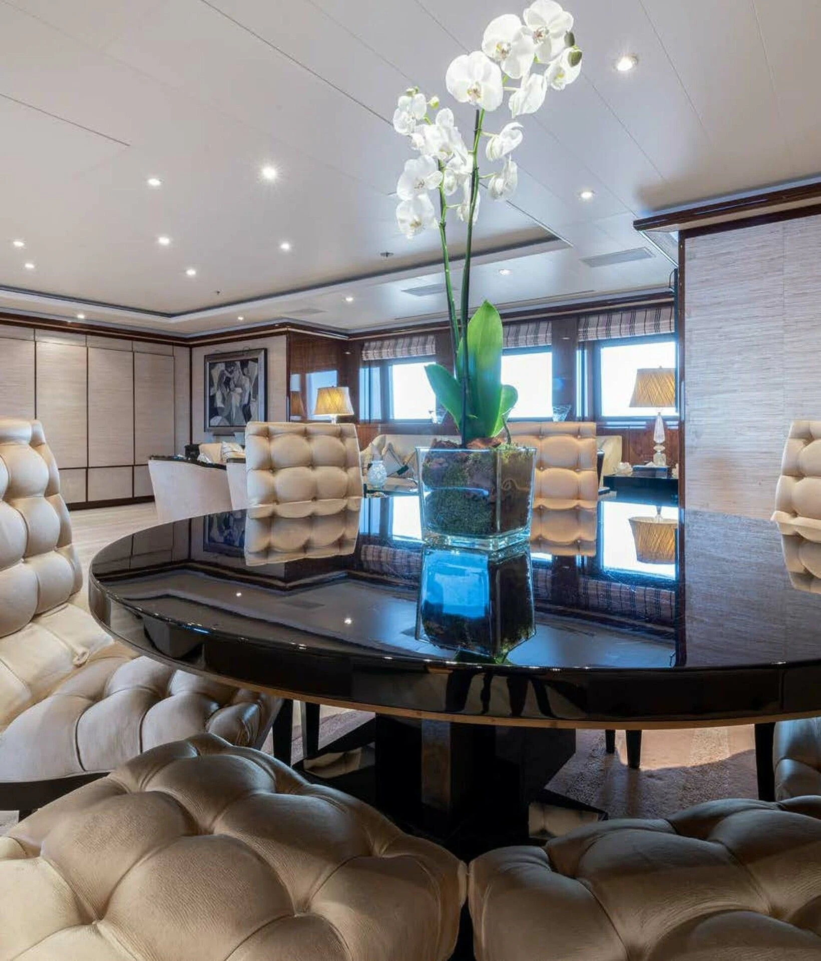 a vase of flowers on a table aboard BATELLO Yacht for Sale