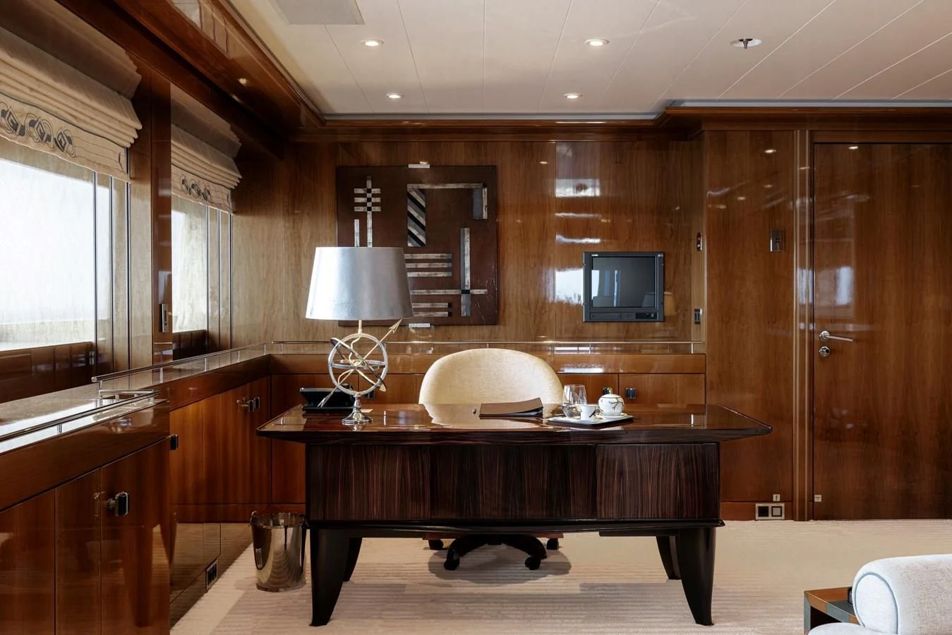 a large bathroom with a large wood cabinet aboard BATELLO Yacht for Sale