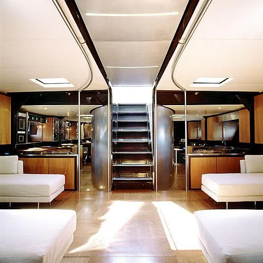 a room with a staircase and a glass door aboard WALLY B Yacht for Sale