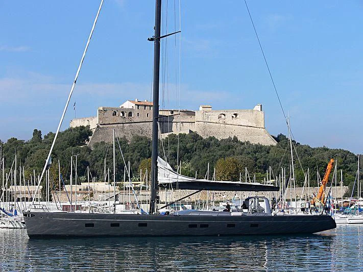 a boat in the water with Alcatraz Island in the background aboard WALLY B Yacht for Sale