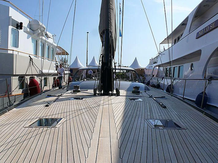 a walkway with boats and people on it aboard WALLY B Yacht for Sale