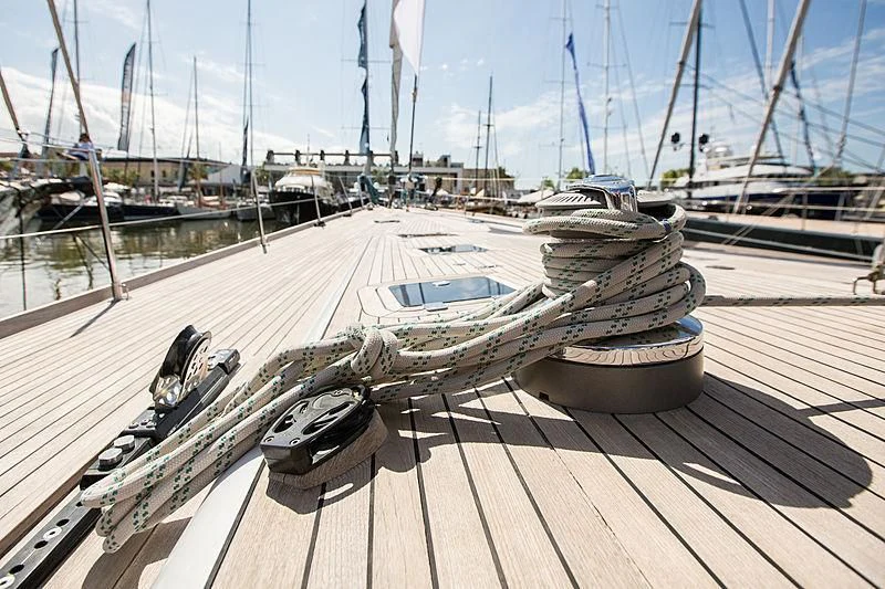 a boat docked at a pier aboard PAN Yacht for Sale