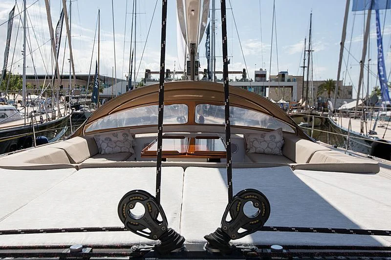 a boat with a steering wheel aboard PAN Yacht for Sale