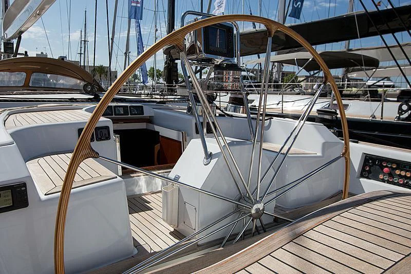 a large white boat on a deck aboard PAN Yacht for Sale
