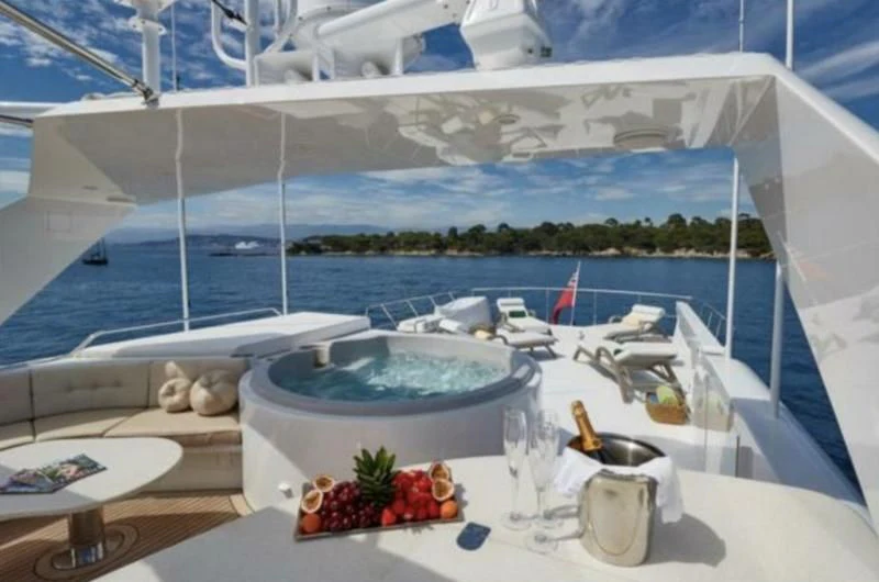 a table with food on it aboard INTEGRITY Yacht for Sale