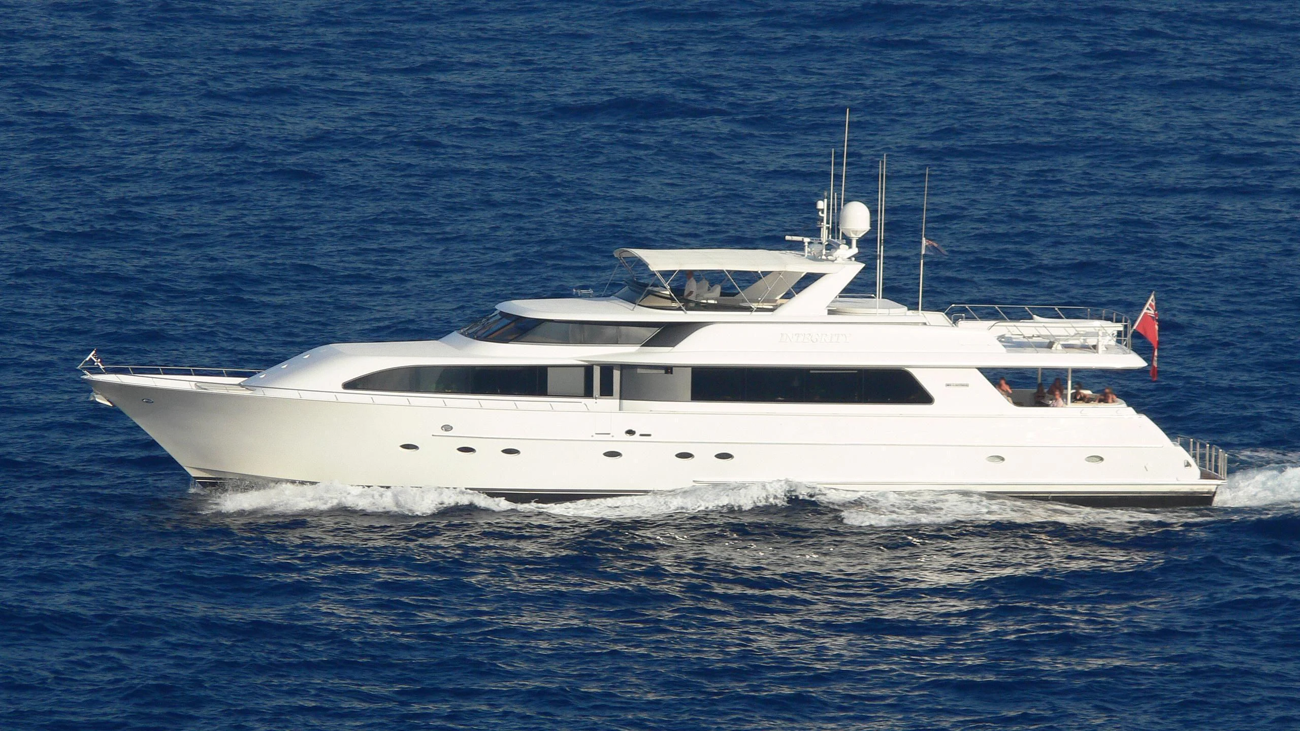 a white yacht in the water aboard INTEGRITY Yacht for Sale