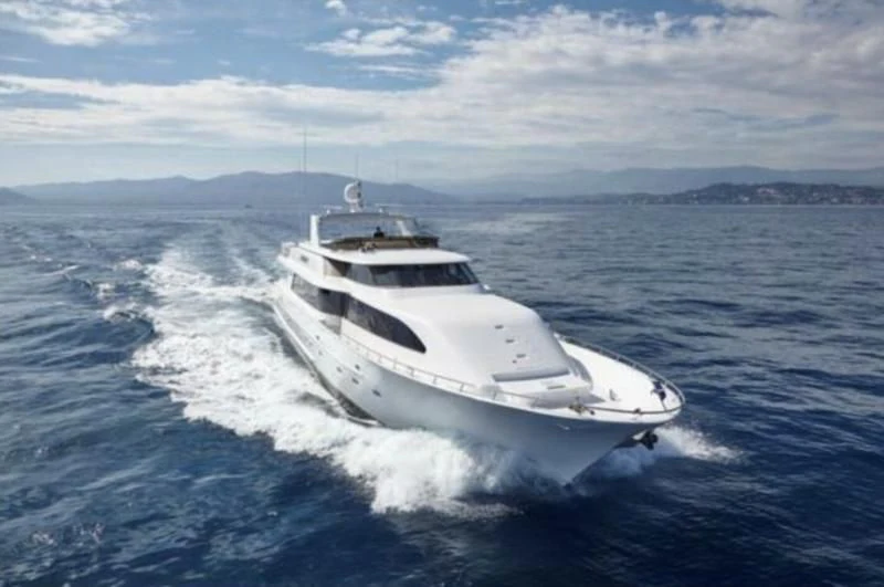 a white yacht on the water aboard INTEGRITY Yacht for Sale