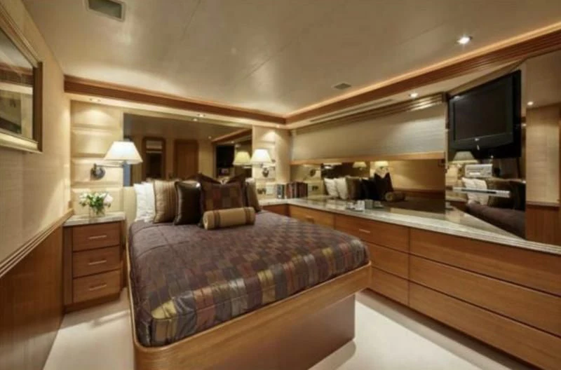 a bedroom with a large bed aboard INTEGRITY Yacht for Sale