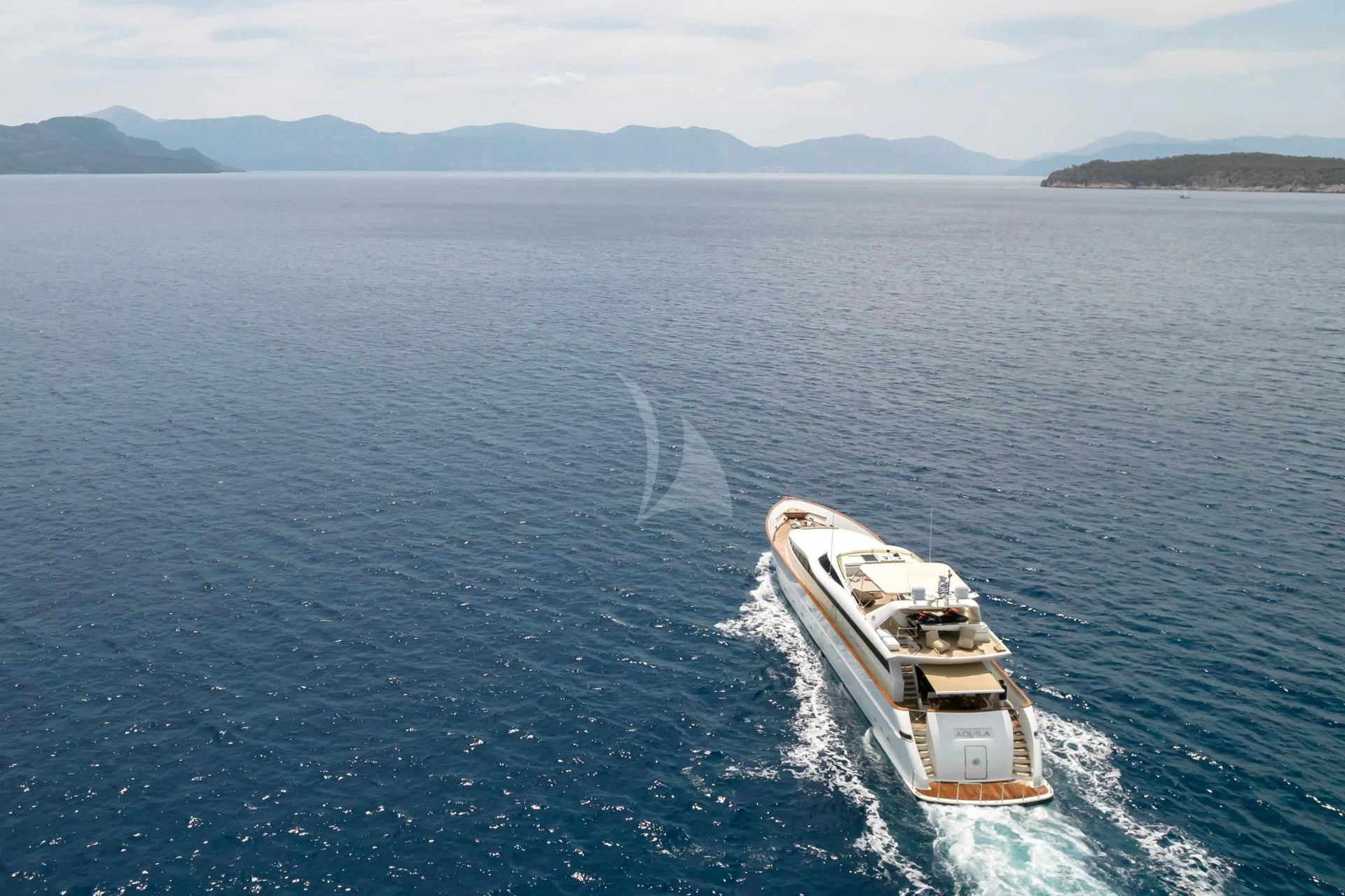 a boat on the water aboard AQUILA Yacht for Sale