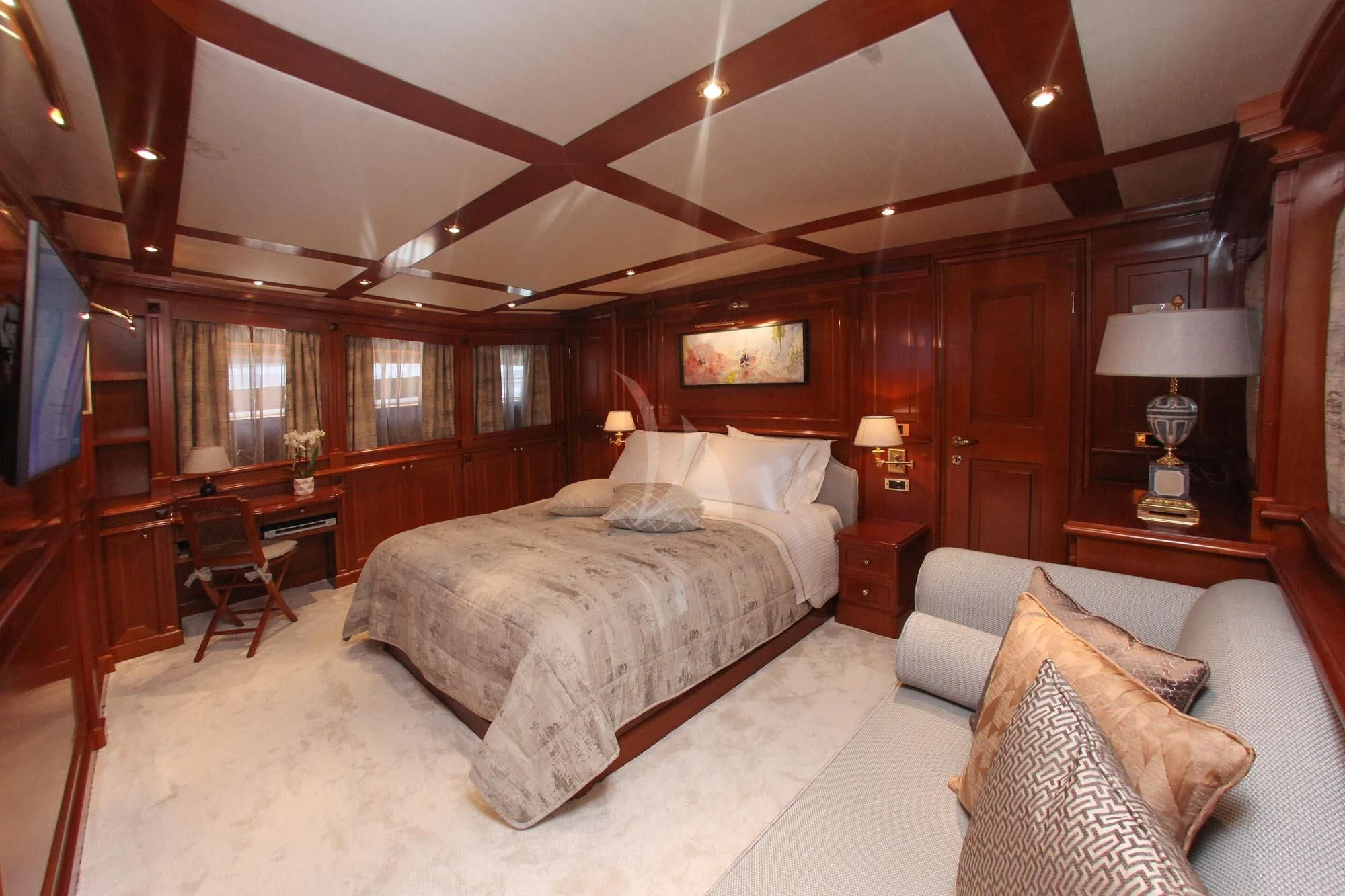 a large bedroom with a large bed aboard AQUILA Yacht for Sale