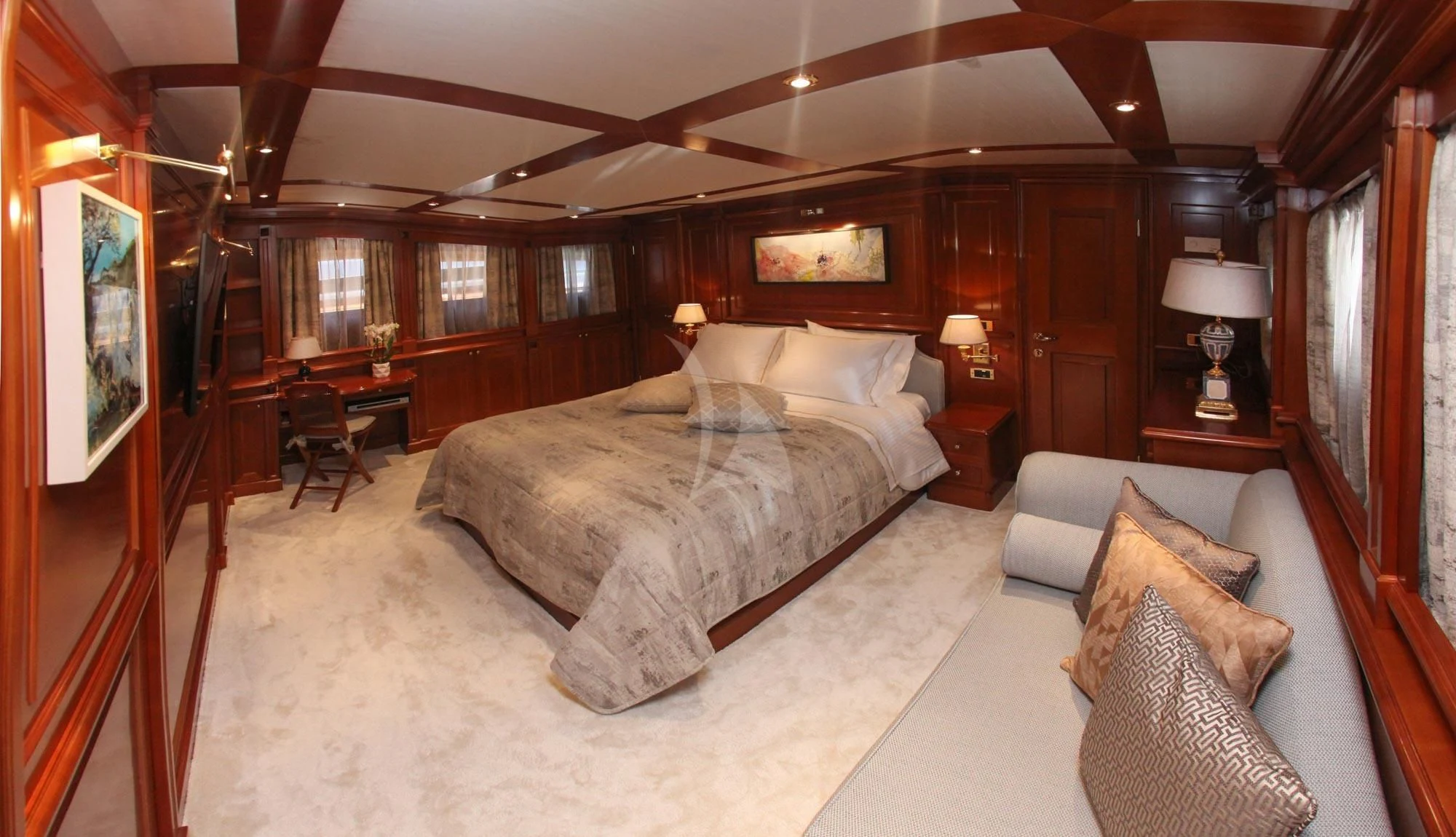a large bedroom with a large bed aboard AQUILA Yacht for Sale