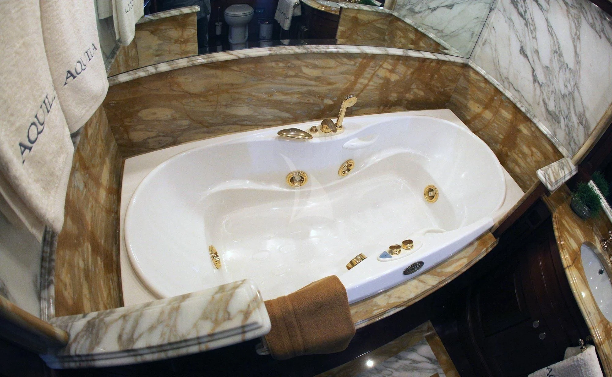 a sink in a bathroom aboard AQUILA Yacht for Sale