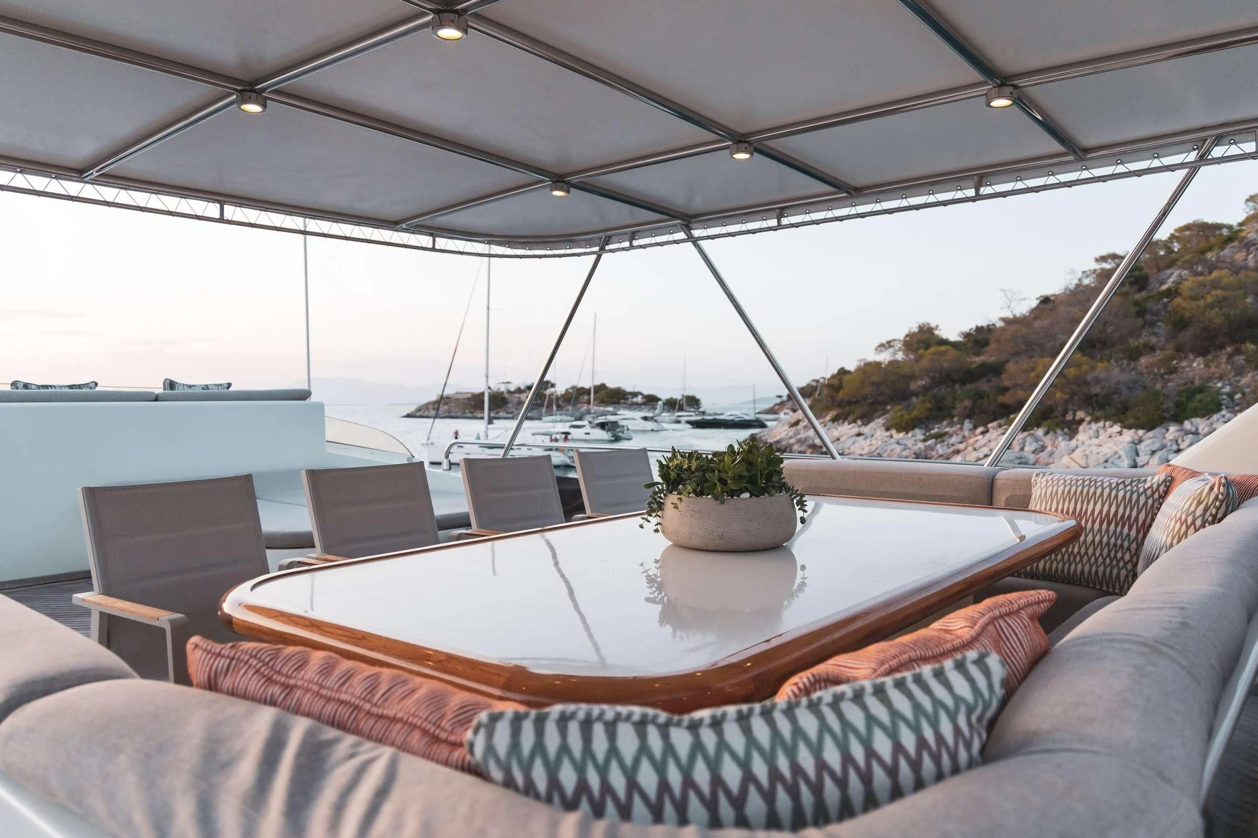 a table on a boat aboard AQUILA Yacht for Sale