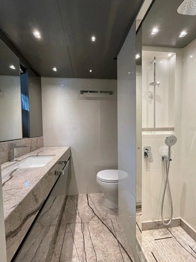 a bathroom with a sink and a toilet aboard SL96A Yacht for Sale