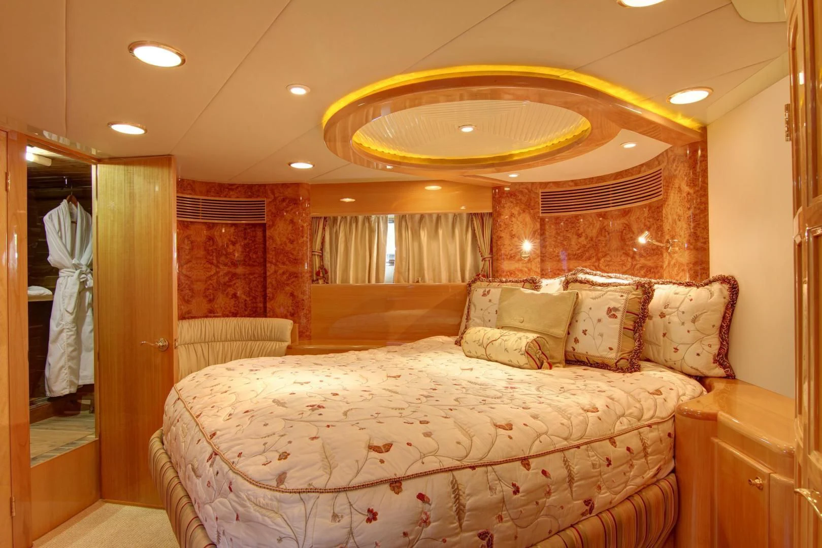a large bed in a hotel room aboard UNSINKABLE II Yacht for Sale