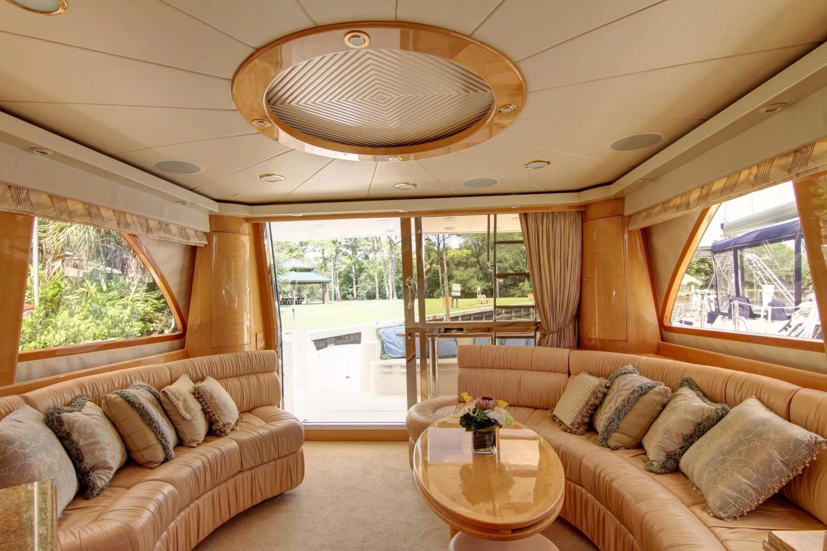 a living room with a large window aboard UNSINKABLE II Yacht for Sale