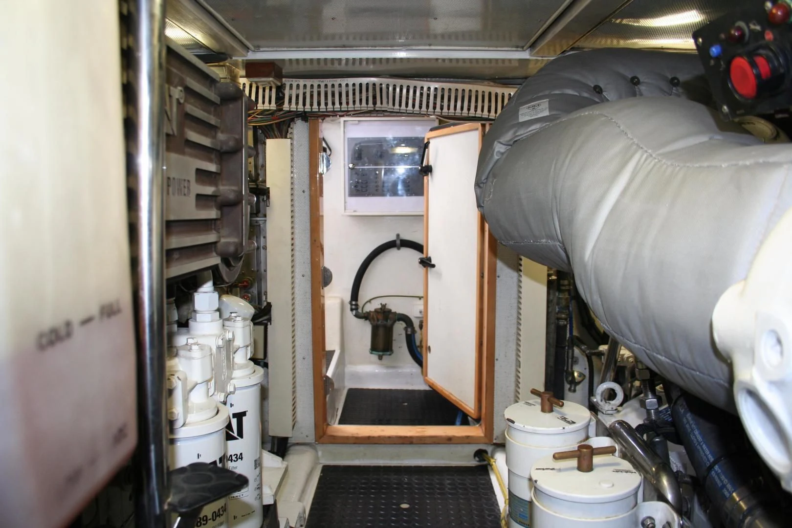 a room with a large machine aboard UNSINKABLE II Yacht for Sale