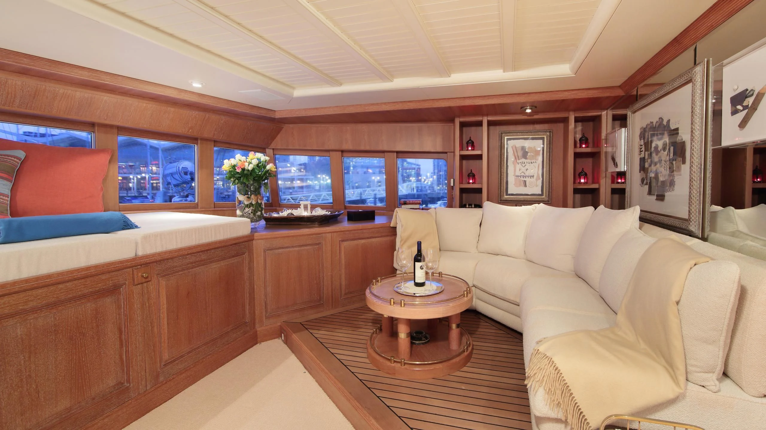 a living room with a couch and a coffee table aboard GLACIAL BEAR Yacht for Sale