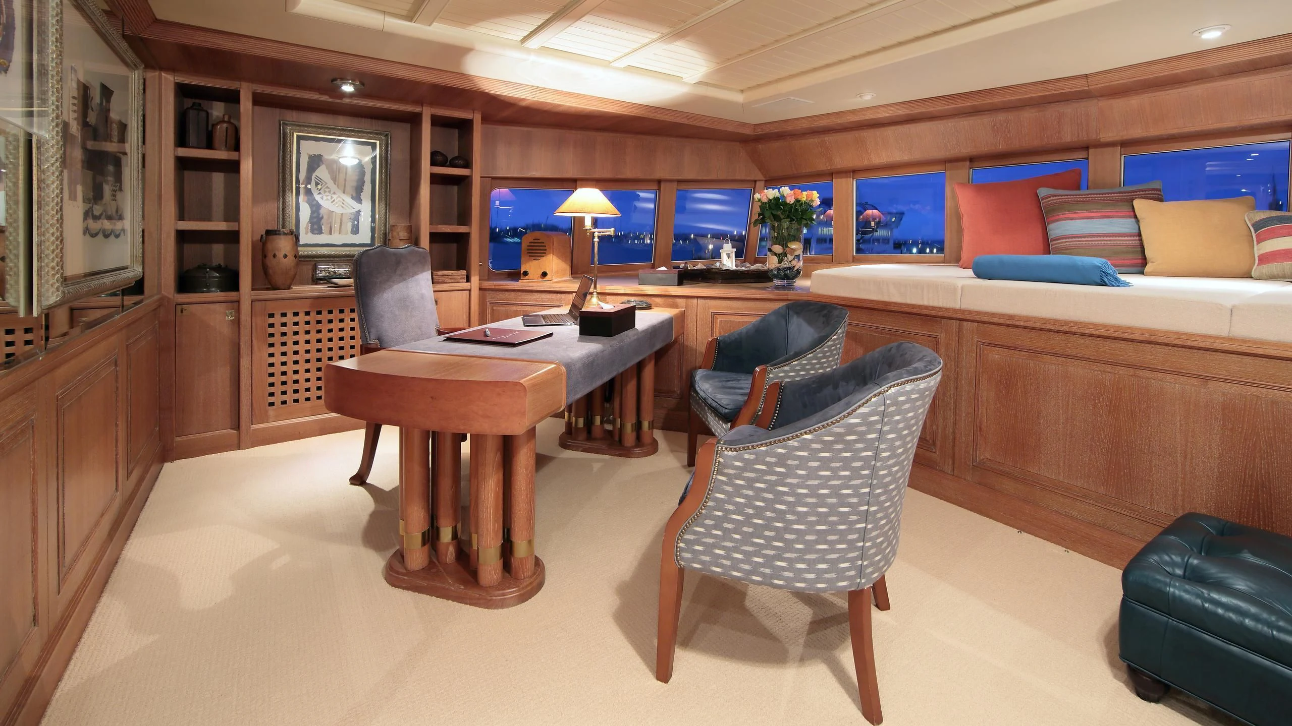a room with a table and chairs aboard GLACIAL BEAR Yacht for Sale