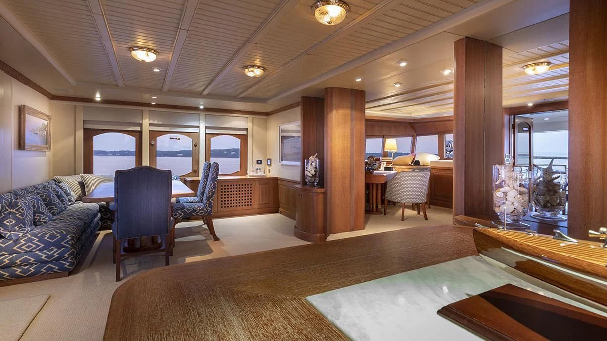 a large living room with a large window aboard GLACIAL BEAR Yacht for Sale