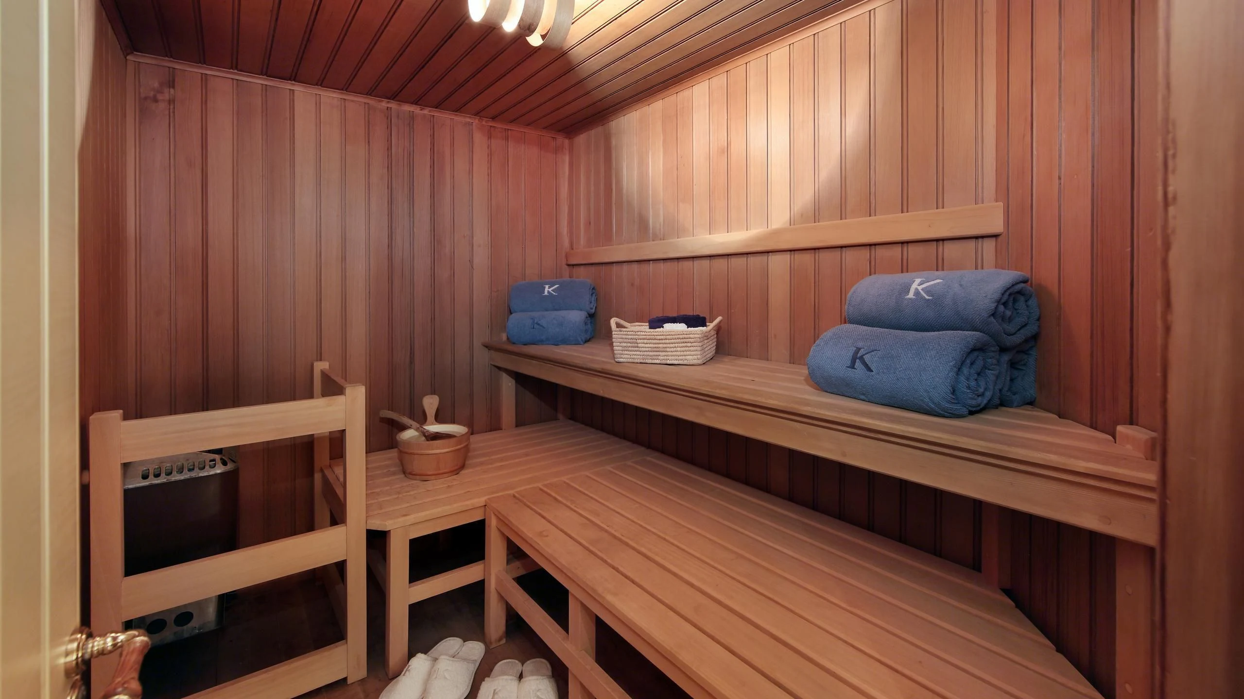 a room with a bed and a television aboard GLACIAL BEAR Yacht for Sale