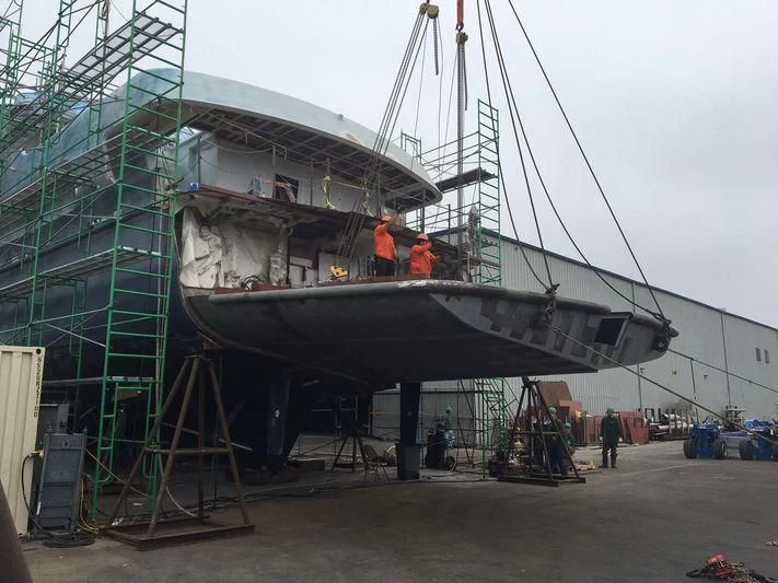 a large metal boat with a crane aboard GLACIAL BEAR Yacht for Sale