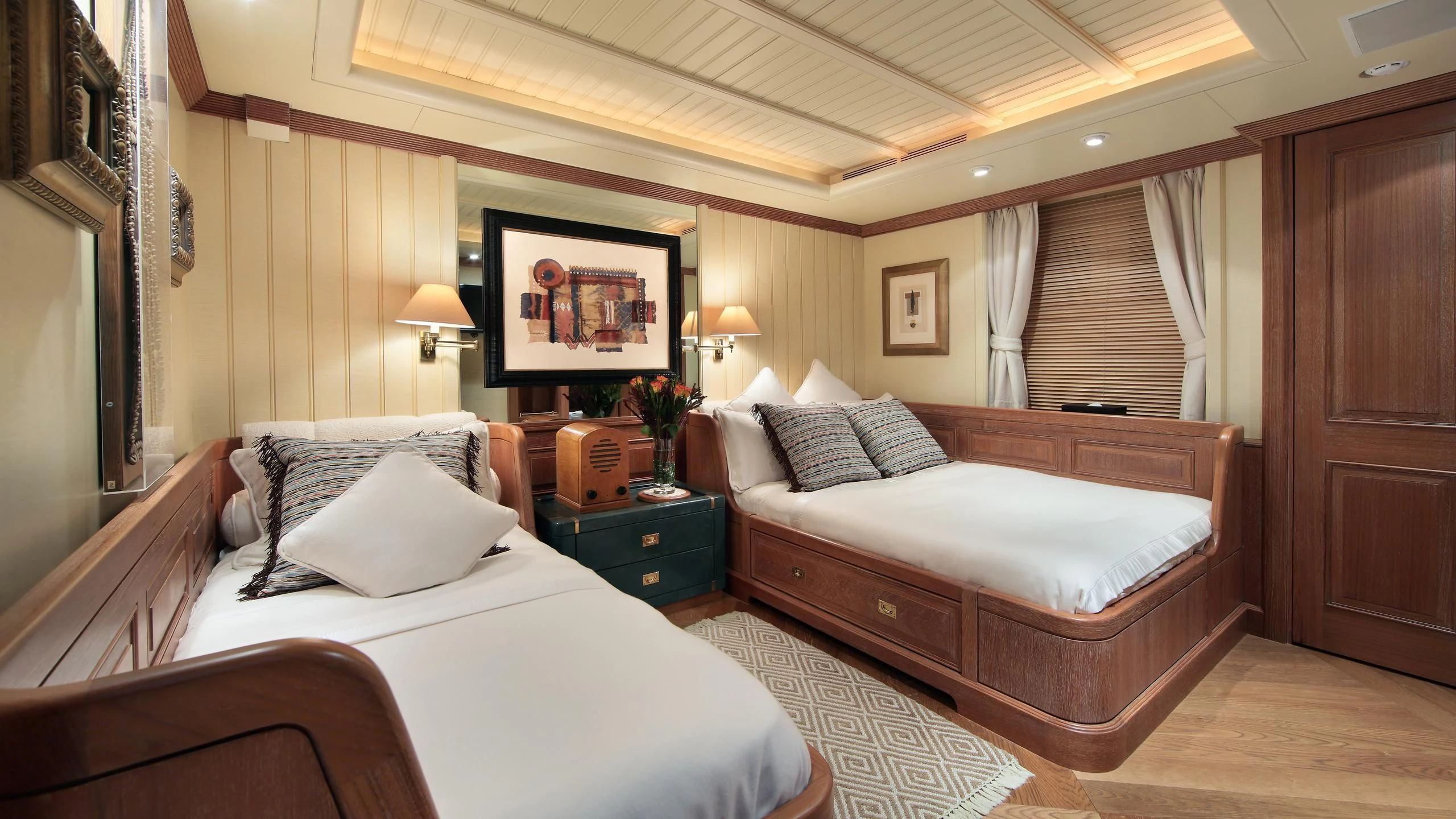 a couple of beds in a hotel room aboard GLACIAL BEAR Yacht for Sale