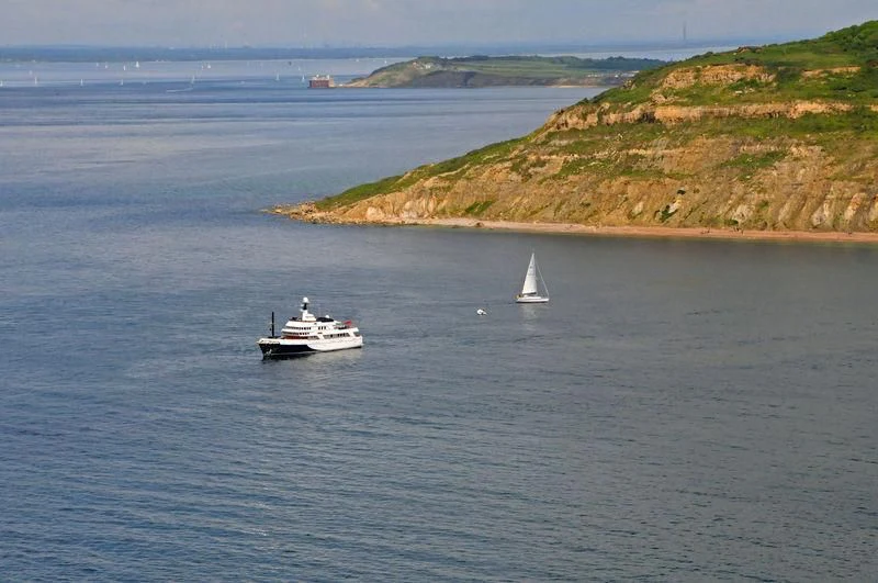 a couple of boats sailing in the sea aboard GLACIAL BEAR Yacht for Sale