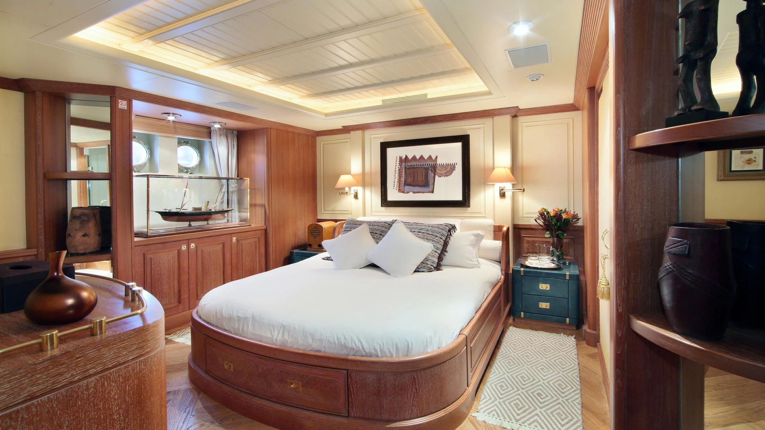 a large bedroom with a large bed aboard GLACIAL BEAR Yacht for Sale
