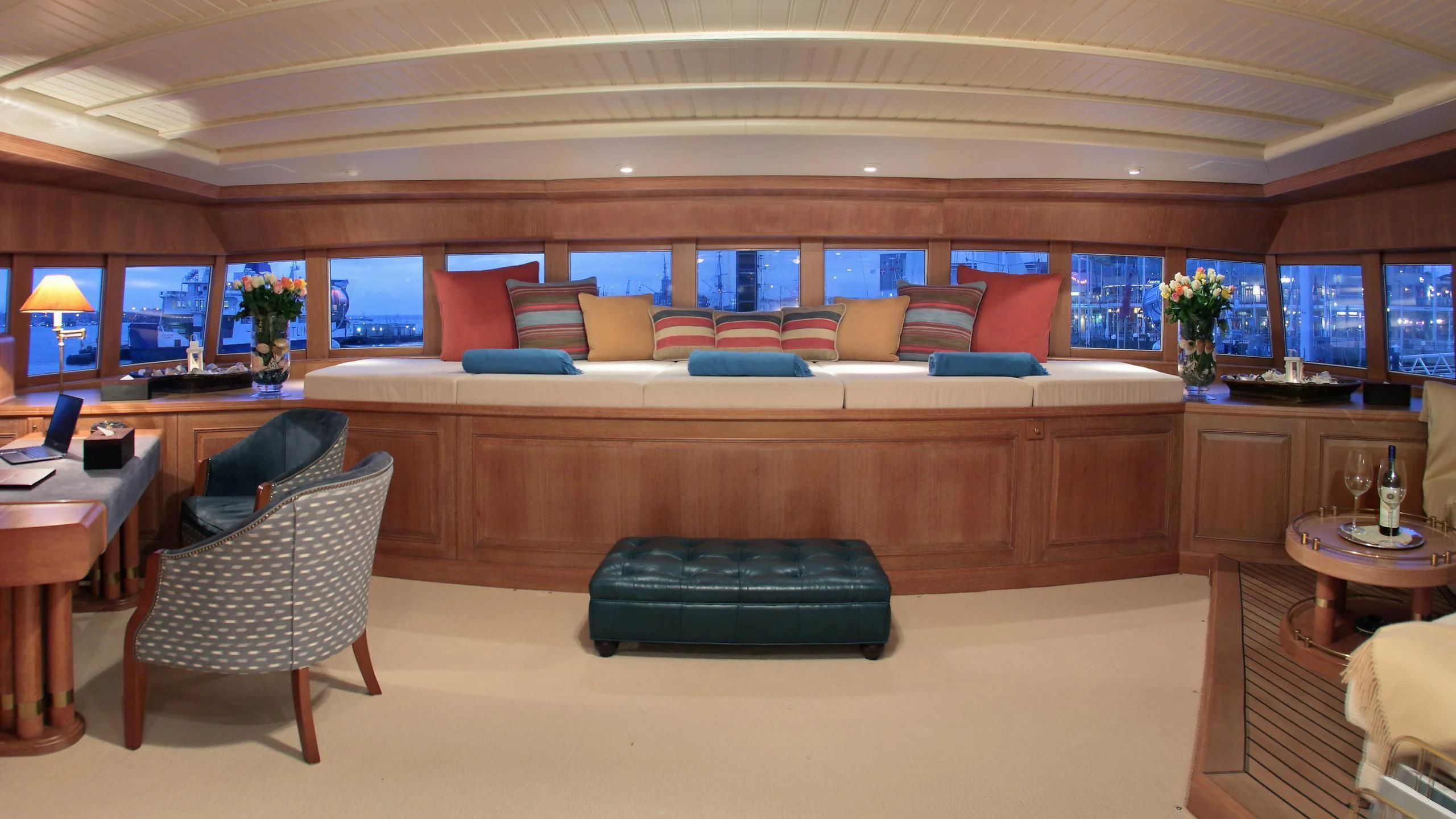 a room with a couch and a table and a tv aboard GLACIAL BEAR Yacht for Sale